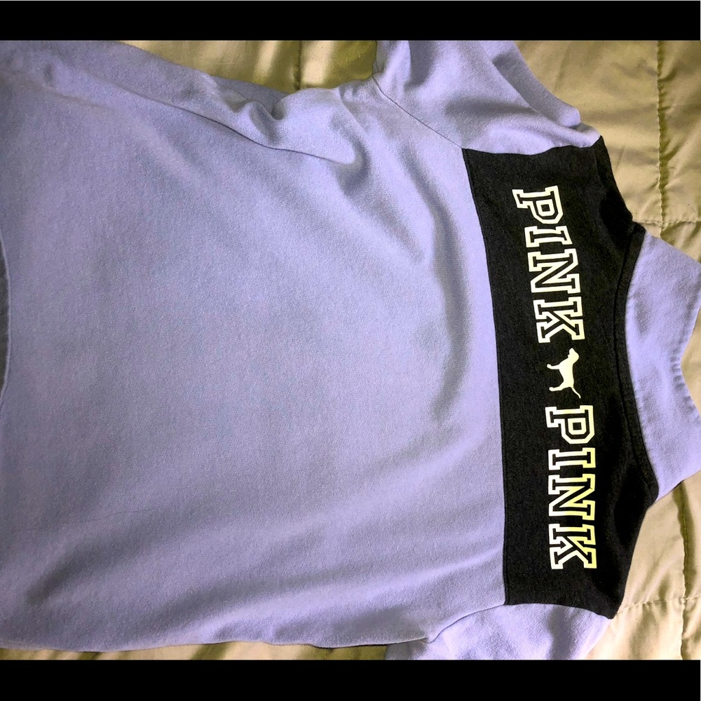 Purple sweater with collar size medium says “Pink” on back.
